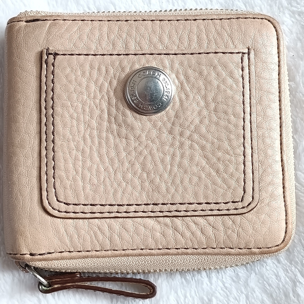 Coach Beige Leather Wallet with Silver Accent.